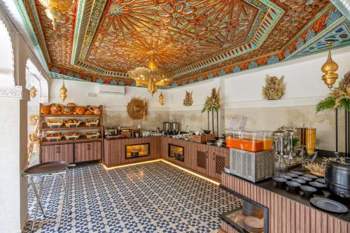 Kuchyň nebo kuchyňský kout v ubytování Palais Moulay Said & SPA
