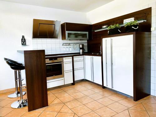 Köök või kööginurk majutusasutuses Residnez Mühlenberg Typ A1