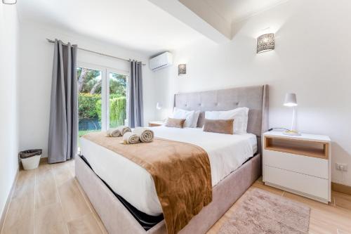Postel nebo postele na pokoji v ubytování Apartamento Pine by Algarve Holidays