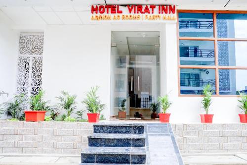 a hotel view inn with stairs in front of a building at Hotel O Virat Inn in Lucknow