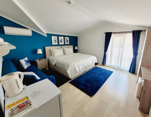 Ένα ή περισσότερα κρεβάτια σε δωμάτιο στο Berg Hotel