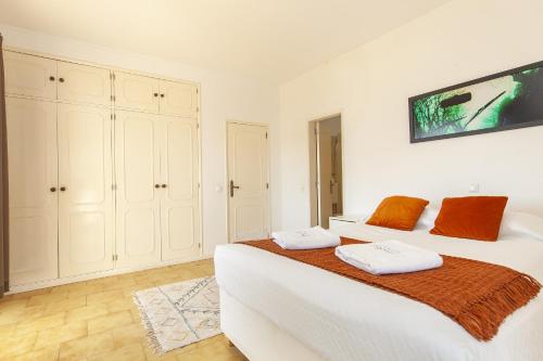 Ένα ή περισσότερα κρεβάτια σε δωμάτιο στο Luz Vista Mar Apartment