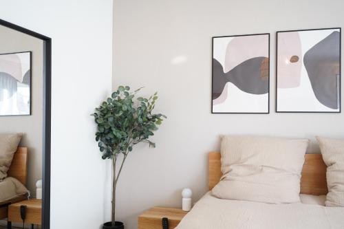 Ένα ή περισσότερα κρεβάτια σε δωμάτιο στο Gartenwohnung, nahe Zentrum Zürich und Flughafen
