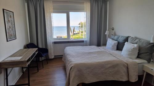 Postel nebo postele na pokoji v ubytování Hotel Udsigten Marstal