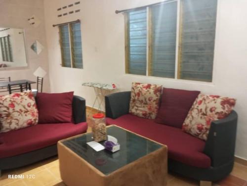 Ruang duduk di Dian 2 Rooms Family House