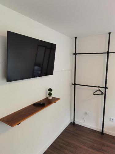 Μια τηλεόραση ή/και κέντρο ψυχαγωγίας στο Relax Apartment Private pool