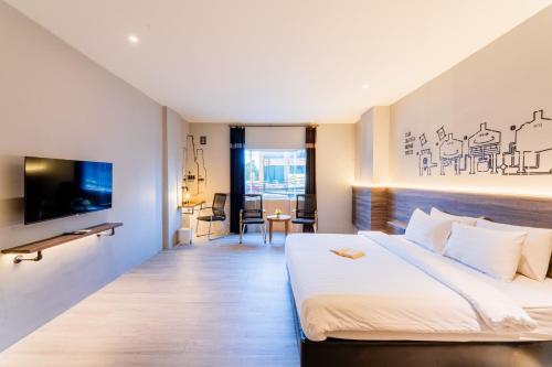 Un ou plusieurs lits dans un hébergement de l'établissement Stark Boutique Hotel and Spa