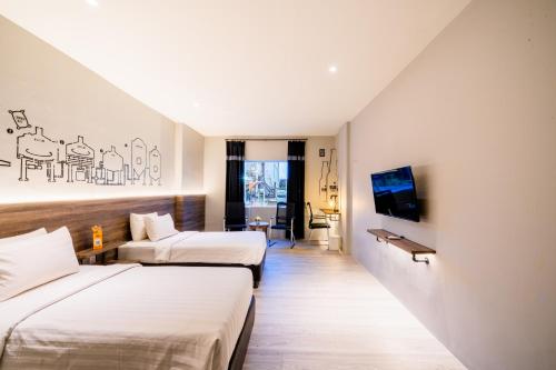 Un ou plusieurs lits dans un hébergement de l'établissement Stark Boutique Hotel and Spa