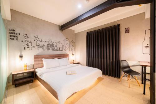 Un ou plusieurs lits dans un hébergement de l'établissement Stark Boutique Hotel and Spa