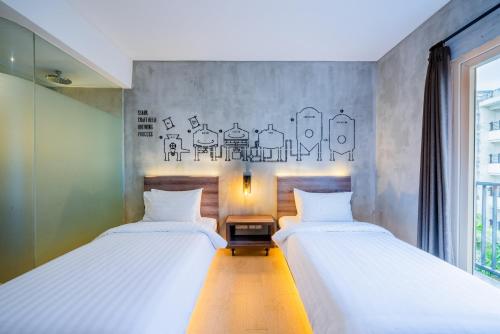 Un ou plusieurs lits dans un hébergement de l'établissement Stark Boutique Hotel and Spa