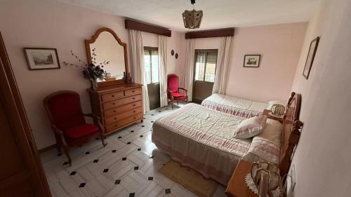 Ένα ή περισσότερα κρεβάτια σε δωμάτιο στο Casa Hierbabuena
