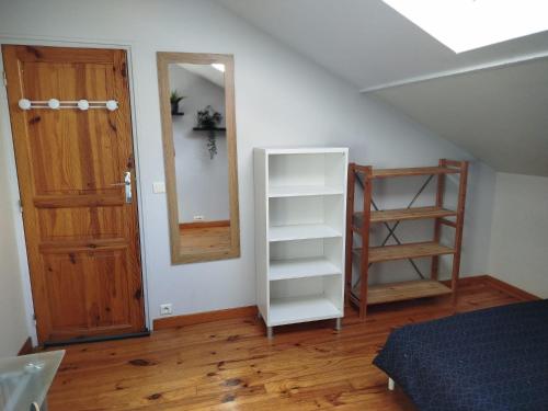 Ein Bett oder Betten in einem Zimmer der Unterkunft Vacances comme à la maison