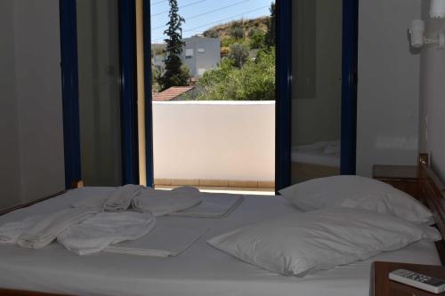 Ένα ή περισσότερα κρεβάτια σε δωμάτιο στο ANEVOLEMA