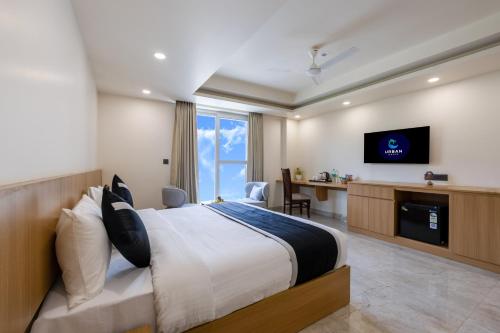 TV/trung tâm giải trí tại Hotel urban oasis Near Huda & Millennium City Centre Metro station I Gurgaon