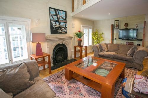 a living room with a couch and a coffee table at Parnell Boulevard Apartments in Dublin