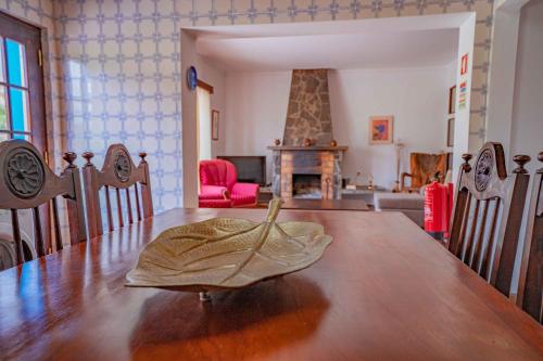a table with a napkin sitting on top of it at Grace Villa in Terra Chã