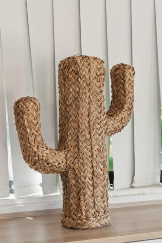 a wicker vase sitting in front of a window at Hôtel La Nartelle in Sainte-Maxime