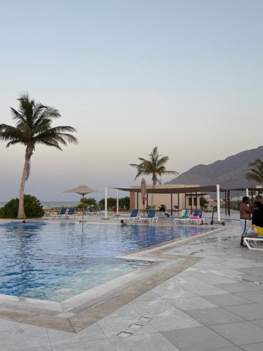 Bazén v ubytování Sifahbeachfront Apartment nebo v jeho okolí
