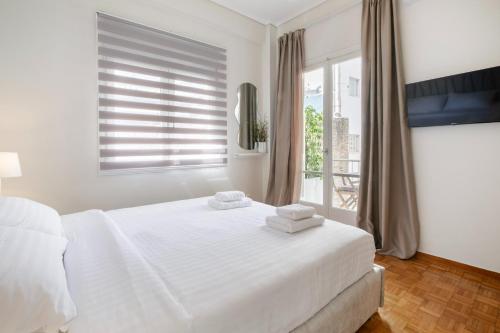 Acropolis Rhea Apartment by A&A Residences
