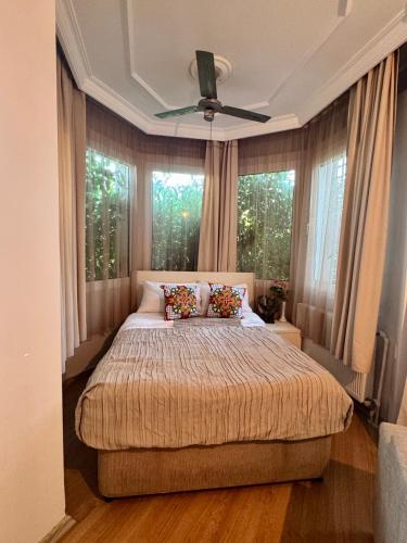 Letto o letti in una camera di Sunyear Guest Houses 2