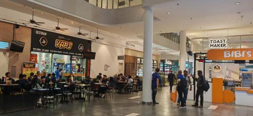 a group of people standing in a shopping mall at Sunway Geo Suites at Bandar Sunway by Ezprop-CA0F in Subang Jaya