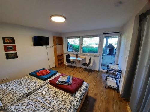 Postel nebo postele na pokoji v ubytování Ferienwohnung Tuniberg