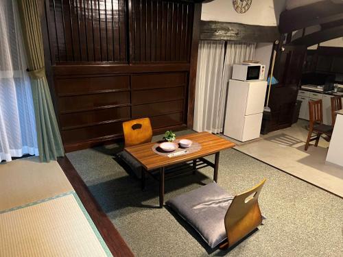 Una cocina o cocineta en 民泊 雪岡庵
