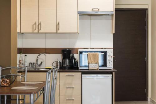 Η κουζίνα ή μικρή κουζίνα στο Sparta View Apartments Anthias Studio A3