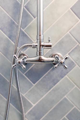 a metal shower fixture in a bathroom at Casa della Musica in Verbania