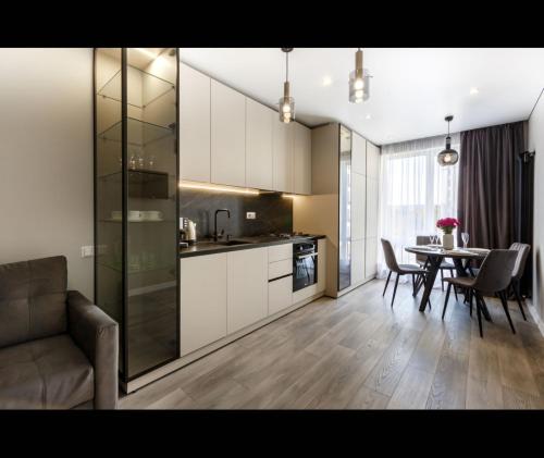 Dapur atau dapur kecil di BUIUCANI APARTAMENTS & TAXI AiRPORT