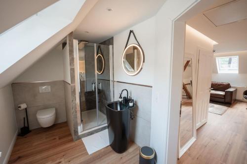 Ένα μπάνιο στο Ferienhaus Kapellenhof mit Infrarotsauna