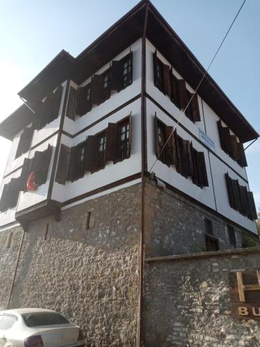 a building with windows on the side of it at Han Safranbolu in Safranbolu