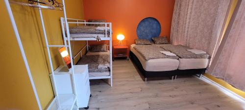 Ein Bett oder Betten in einem Zimmer der Unterkunft Hostel Fjordur