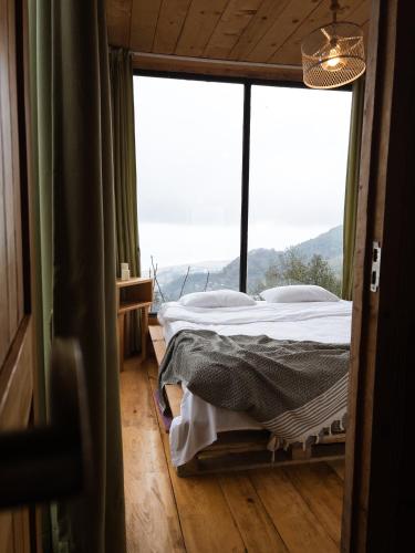 Una cama o camas en una habitación de Gonio Limoncello