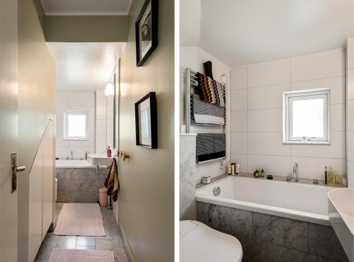 a bathroom with a tub and a toilet and a sink at Luxurious family villa in a unique location in Djursholm