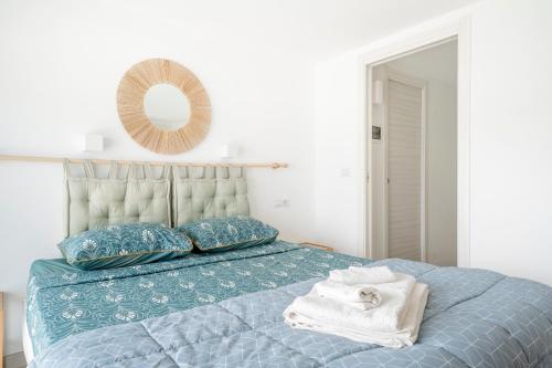 Postel nebo postele na pokoji v ubytování Eos Sea View Apartments