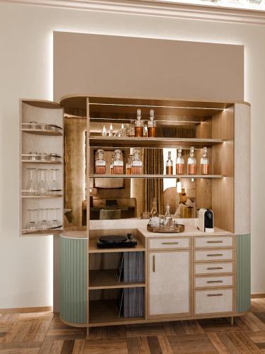 a kitchen with a counter with a sink and shelves at Rosetta Hotel Perugia Tapestry Collection By Hilton in Perugia