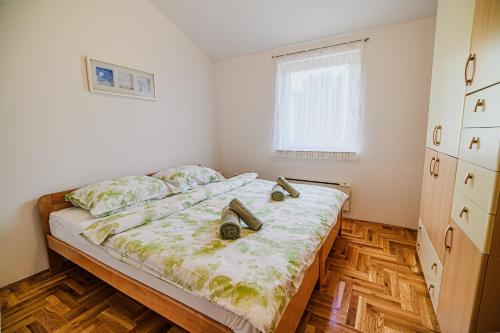 Postel nebo postele na pokoji v ubytování Apartment Tomislav