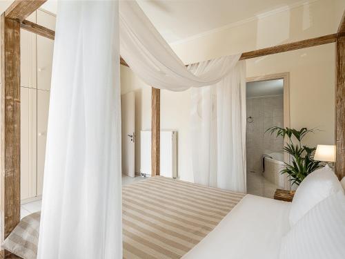 Ένα ή περισσότερα κρεβάτια σε δωμάτιο στο Villa Crista