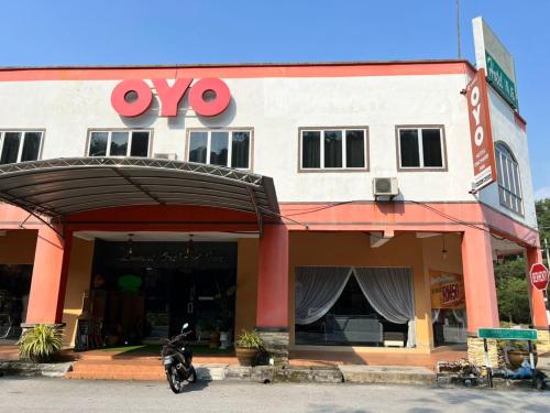 a store with a motorcycle parked in front of it at Dancenter Near Shell Jalan Iskandar Shah, Orchard in Kampong Tebing Rabak