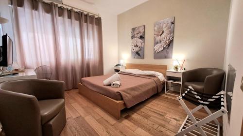 Postel nebo postele na pokoji v ubytování Hotel Del Viale