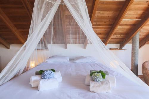 Letto o letti in una camera di Blue OceanView Relaxing Cottage