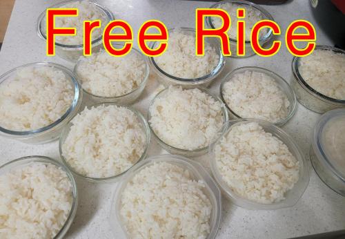 a group of glass bowls of rice on a counter at Sweet House in Seoul