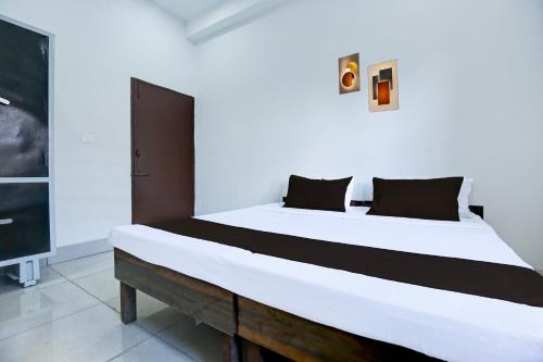 Katil atau katil-katil dalam bilik di Hotel O NRI Guest House