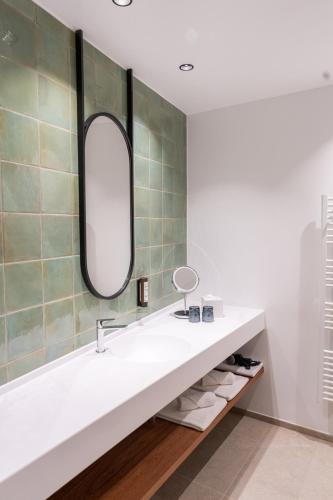 Un baño de Hotel Tenz