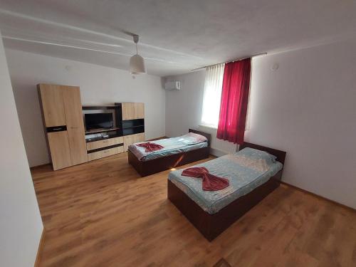 Ένα ή περισσότερα κρεβάτια σε δωμάτιο στο Varipatti House