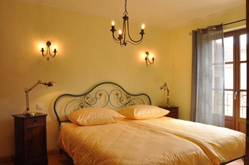 Ένα ή περισσότερα κρεβάτια σε δωμάτιο στο Vinauberge