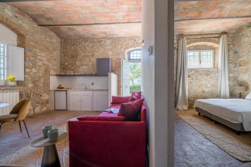 Postel nebo postele na pokoji v ubytování Relais Badia a Passignano