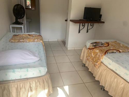 Katil atau katil-katil dalam bilik di Hotel economic eldorado Sorocaba