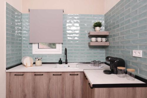 Η κουζίνα ή μικρή κουζίνα στο Olivia Apartment 3